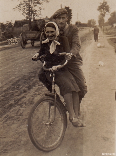 Lodka Chuczer on a bike with a friend named Heniek, 1939